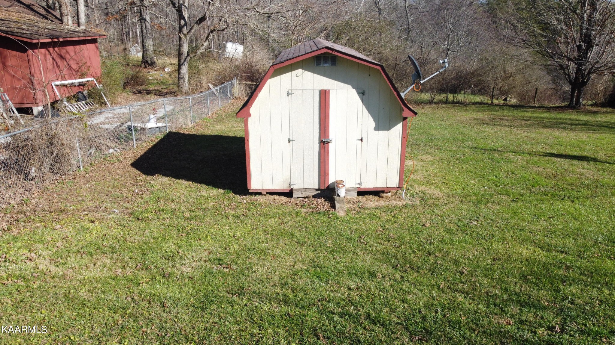 436 Fox Creek Road Crossville, TN 38571 - Photo 6 of 22 a view of backyard with tub and trees