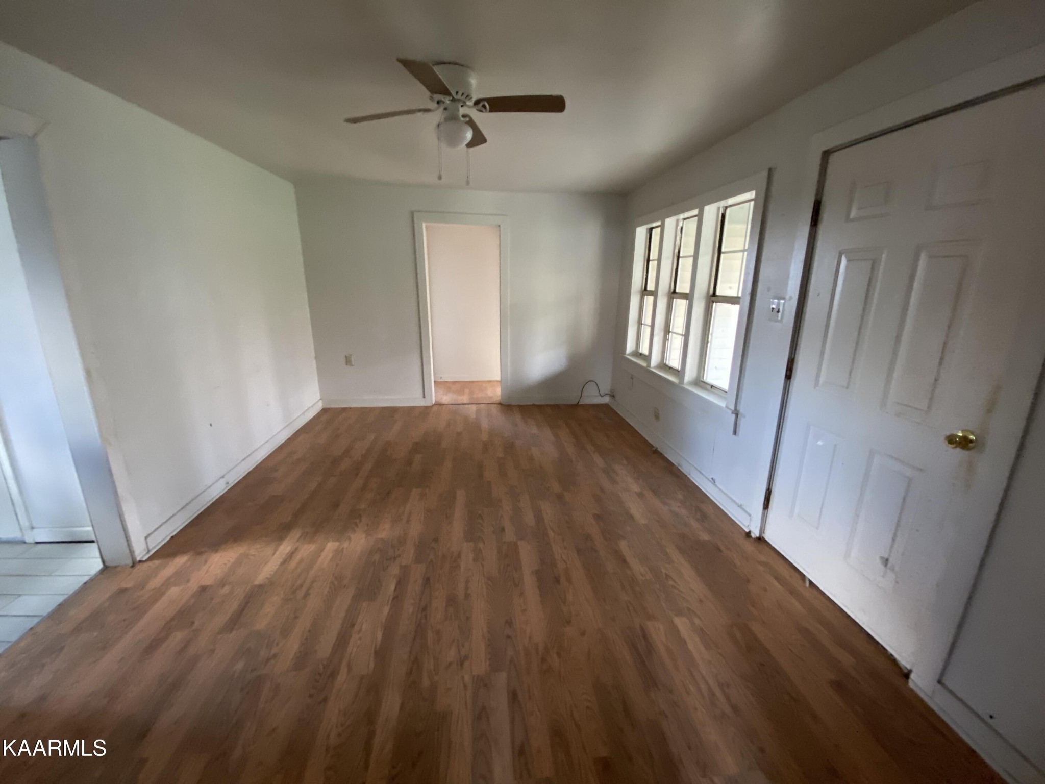 436 Fox Creek Road Crossville, TN 38571 - Photo 9 of 22 a view of empty room with wooden floor and fan