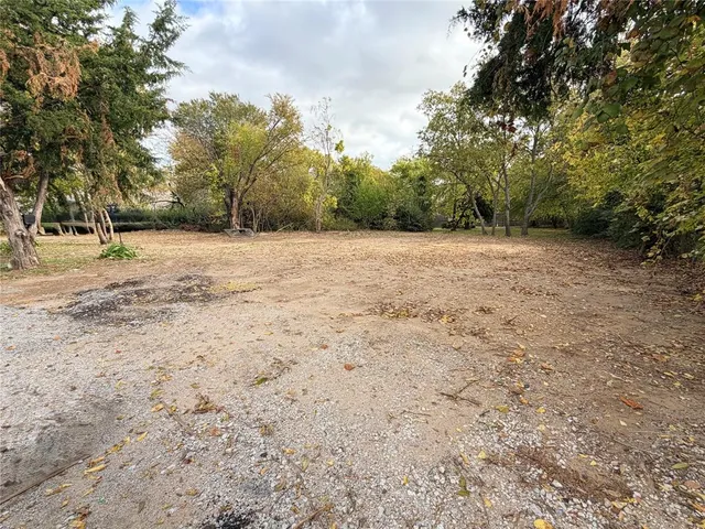 a view of empty room with trees