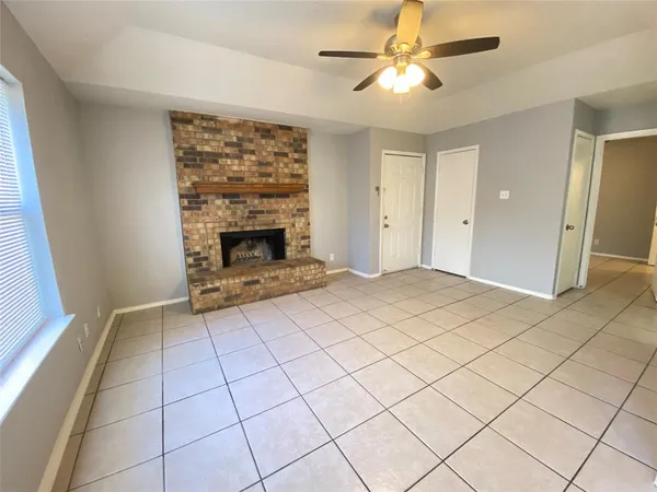 a living room with a fireplace