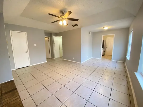 a view of a livingroom with wooden floor