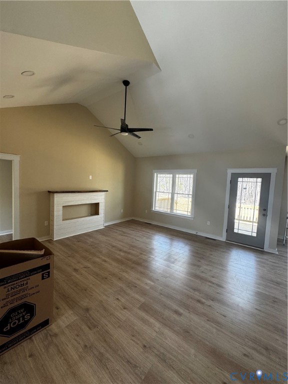 239 Bumpass Road Bumpass, VA 23024 - Photo 3 of 19 a view of a room with wooden floor and window