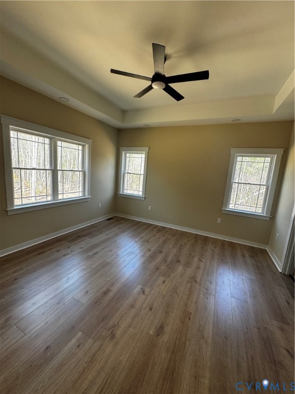 239 Bumpass Road Bumpass, VA 23024 - Photo 6 of 19 a view of an empty room with wooden floor and a window