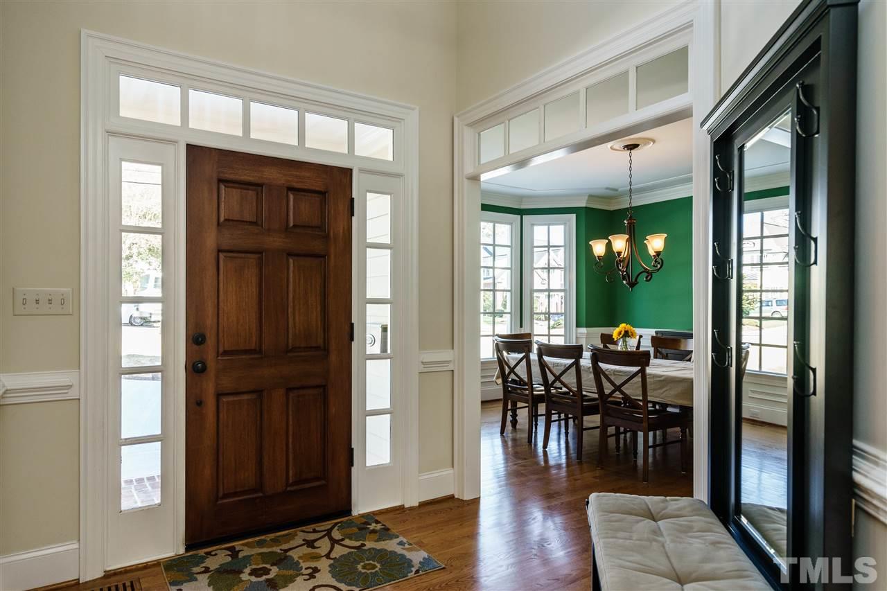 2810 Anderson Drive Raleigh, NC 27608 - Photo 3 of 25 a view of a livingroom with furniture window and wooden floor