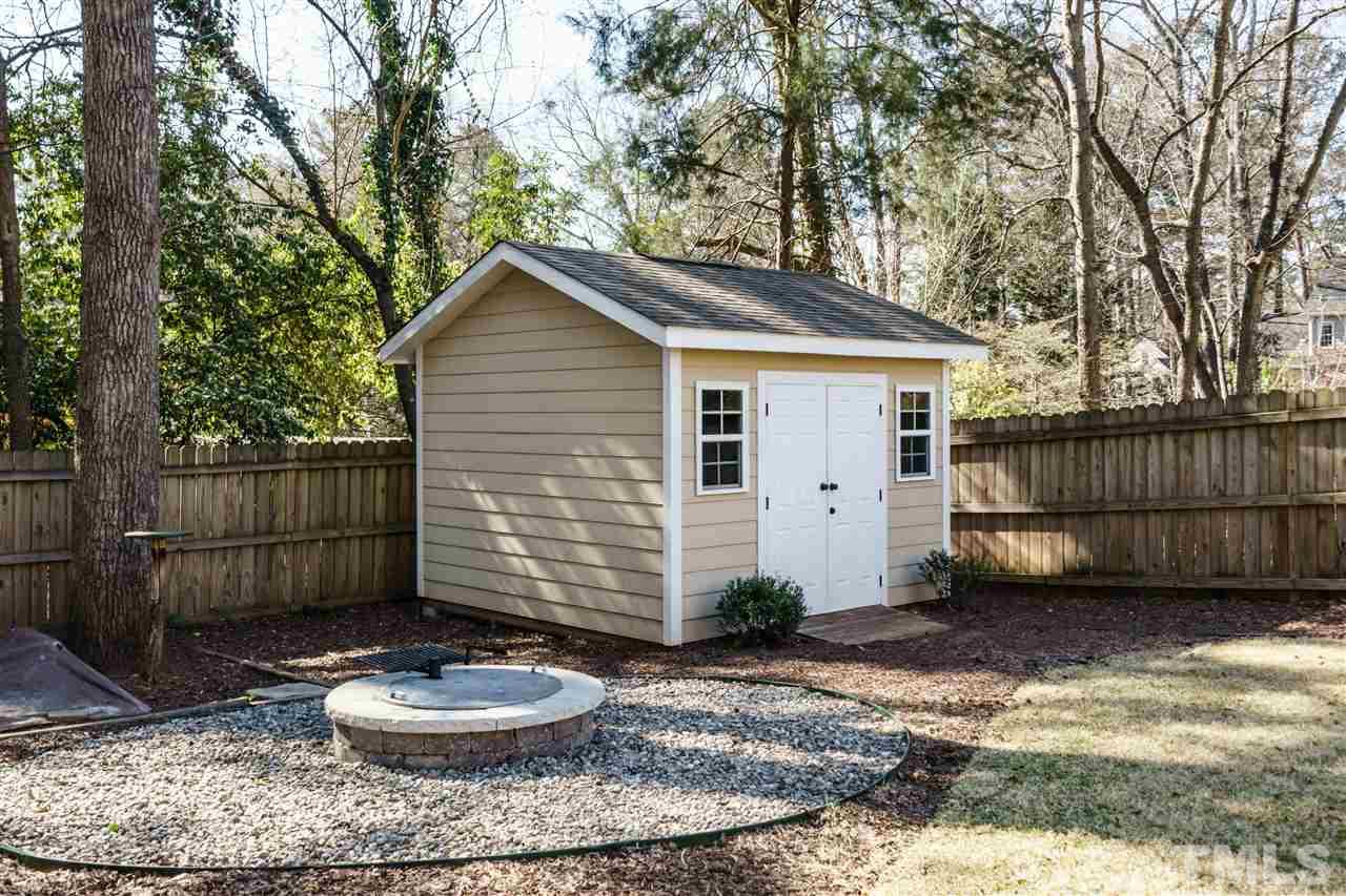 2810 Anderson Drive Raleigh, NC 27608 - Photo 22 of 25 a backyard of house with a tree