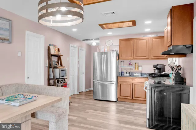 a view of a living room and dining room