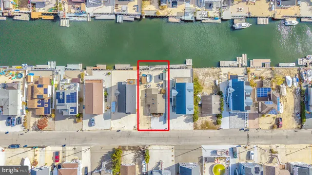a view of a storage and utility room with a window