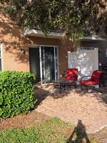 a view of a chairs in front of house
