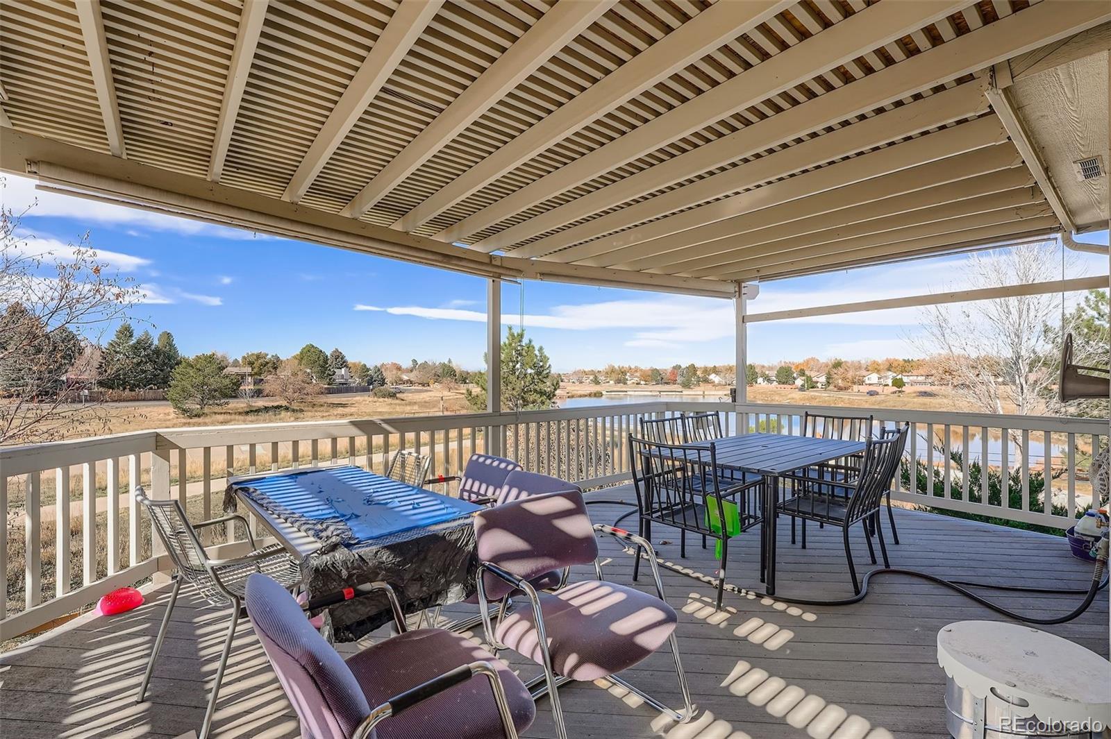 2743 South Waco Way Aurora, CO 80013 - Photo 26 of 28 a view of a balcony with furniture
