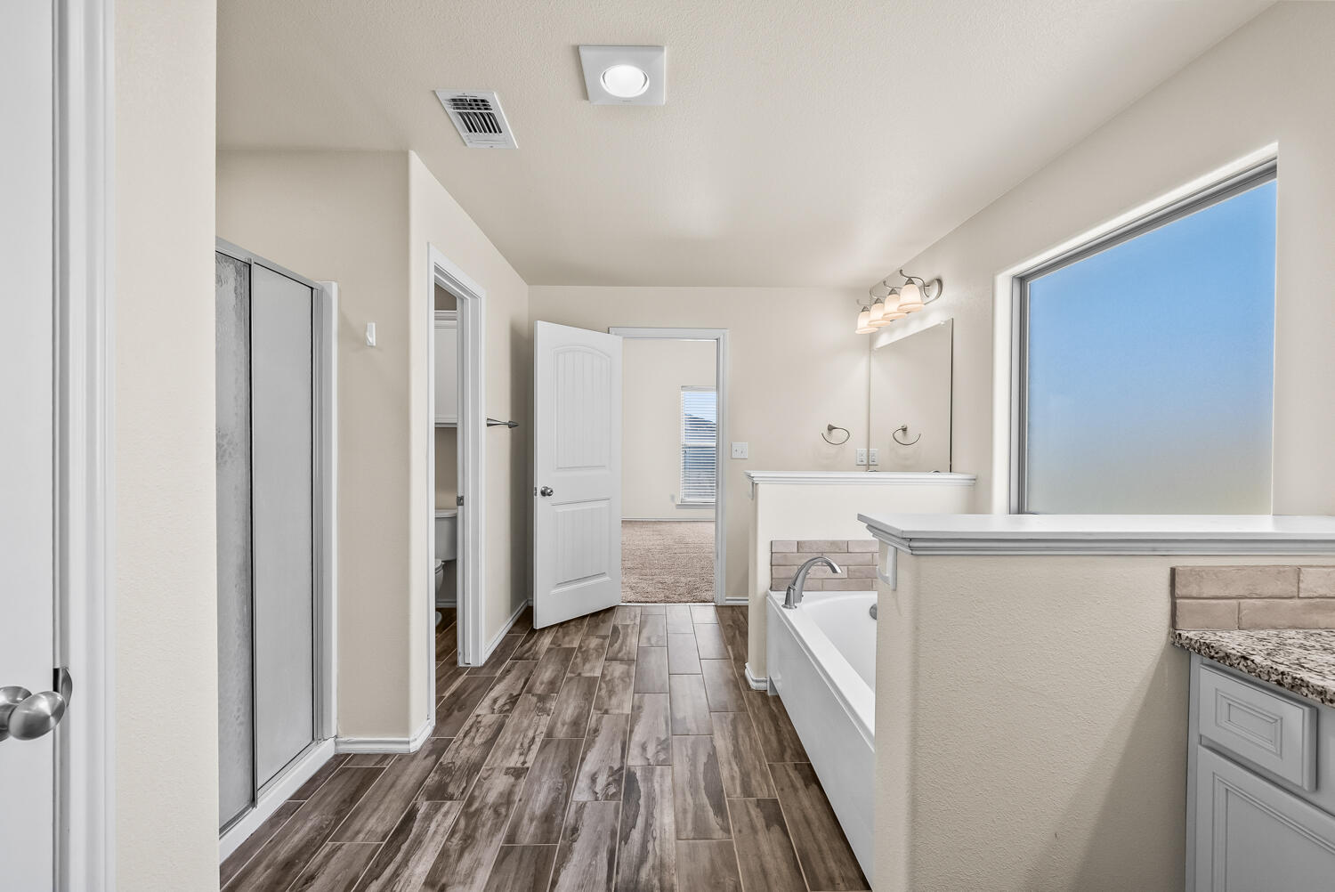 7027 37th Street Lubbock, TX 79407 - Photo 15 of 36 a view of a kitchen with a sink and dishwasher