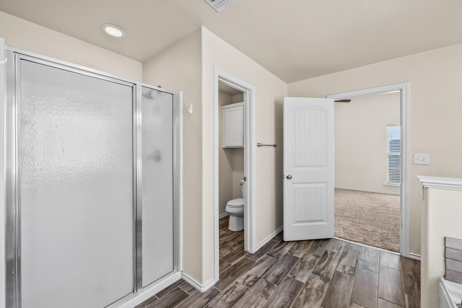 7027 37th Street Lubbock, TX 79407 - Photo 17 of 36 a view of entryway with wooden floor