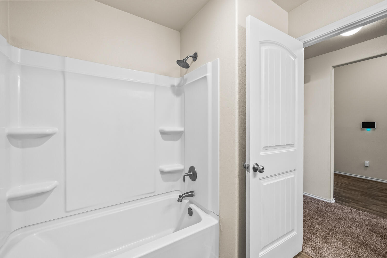 7027 37th Street Lubbock, TX 79407 - Photo 25 of 36 a bathroom with a bathtub