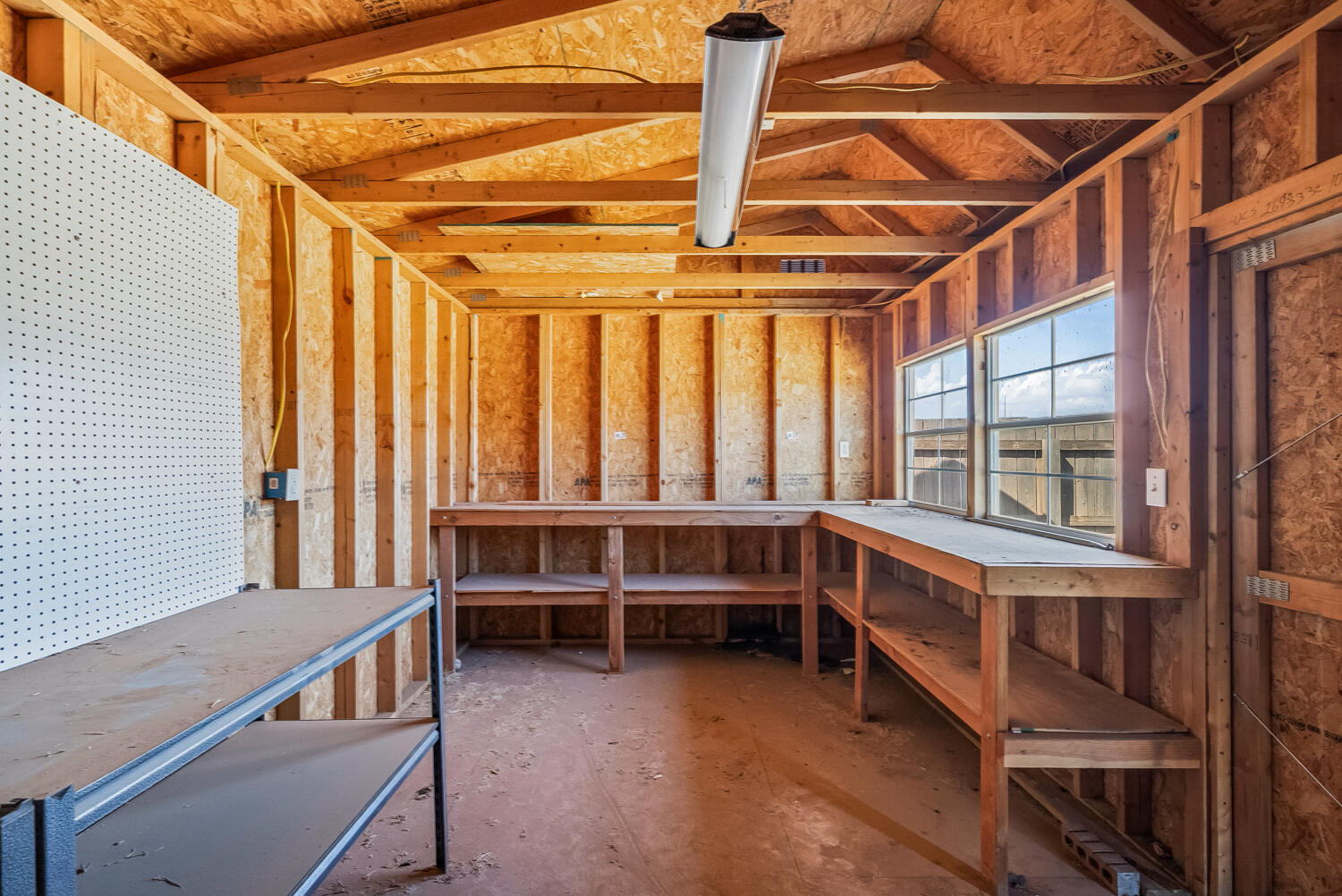 7027 37th Street Lubbock, TX 79407 - Photo 32 of 36 a view of an empty room with a window