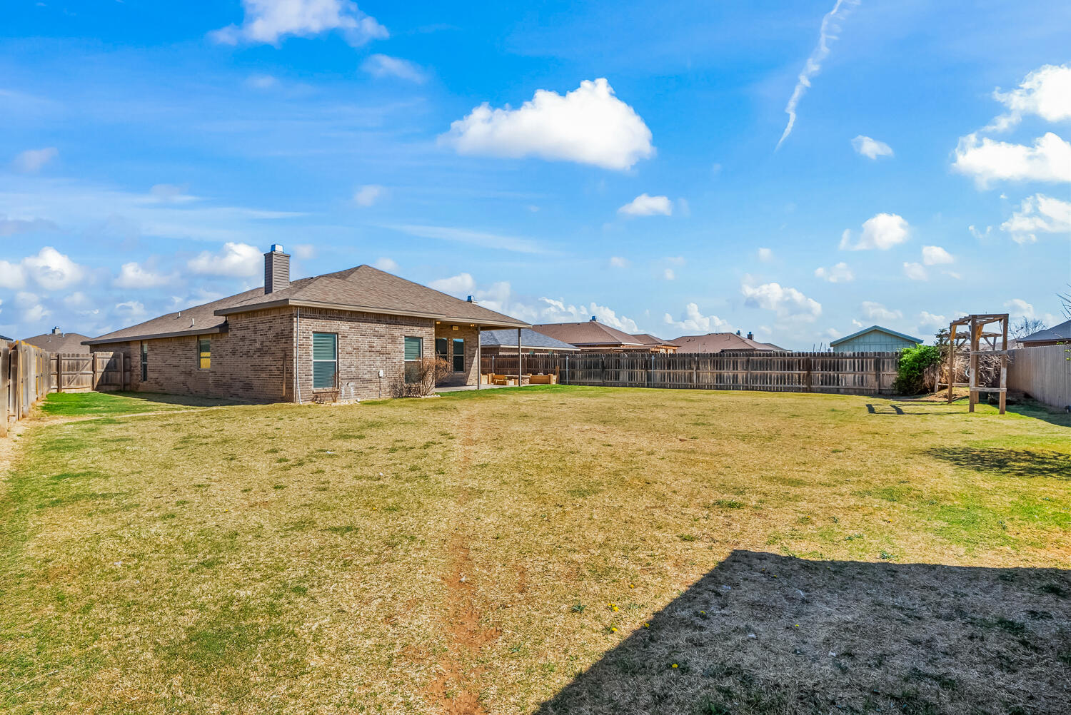7027 37th Street Lubbock, TX 79407 - Photo 36 of 36 a front view of a house with a lake view