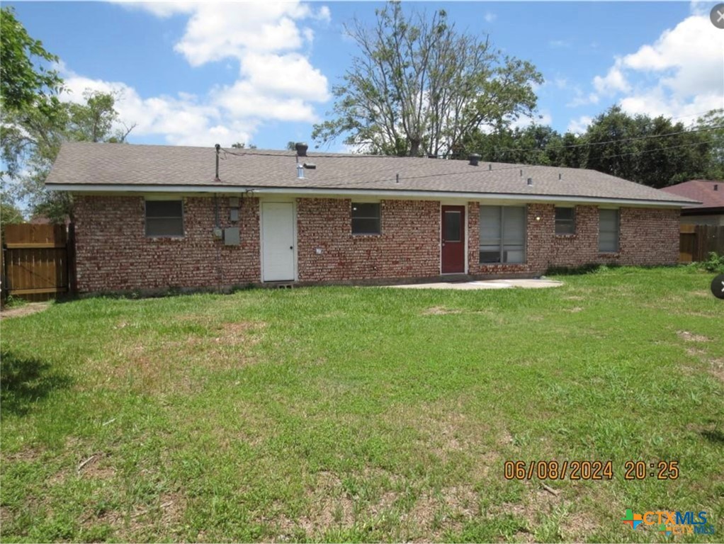 205 Avalon Drive Victoria, TX 77901 - Photo 1 of 9 a view of a yard in front of a house