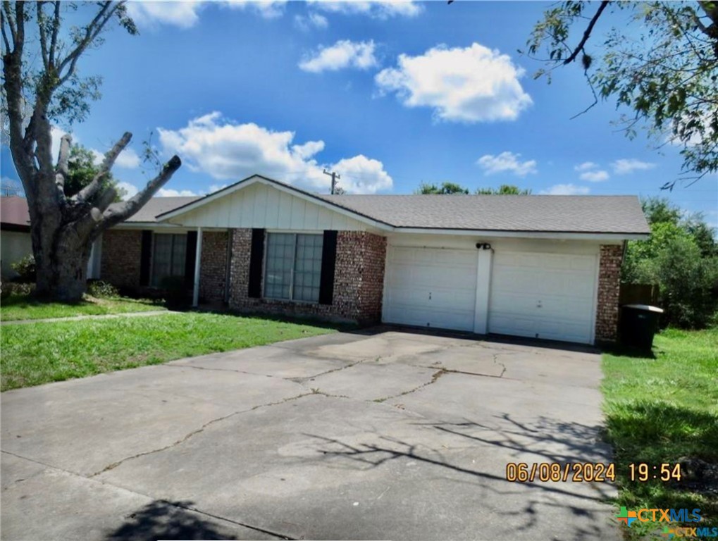 205 Avalon Drive Victoria, TX 77901 - Photo 9 of 9 a front view of a house with yard