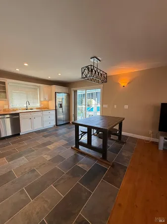 a view of a dining room with furniture
