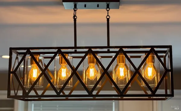 a kitchen with stainless steel appliances granite countertop a stove and a microwave