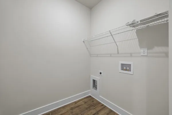 a view of a livingroom with a ceiling fan and window
