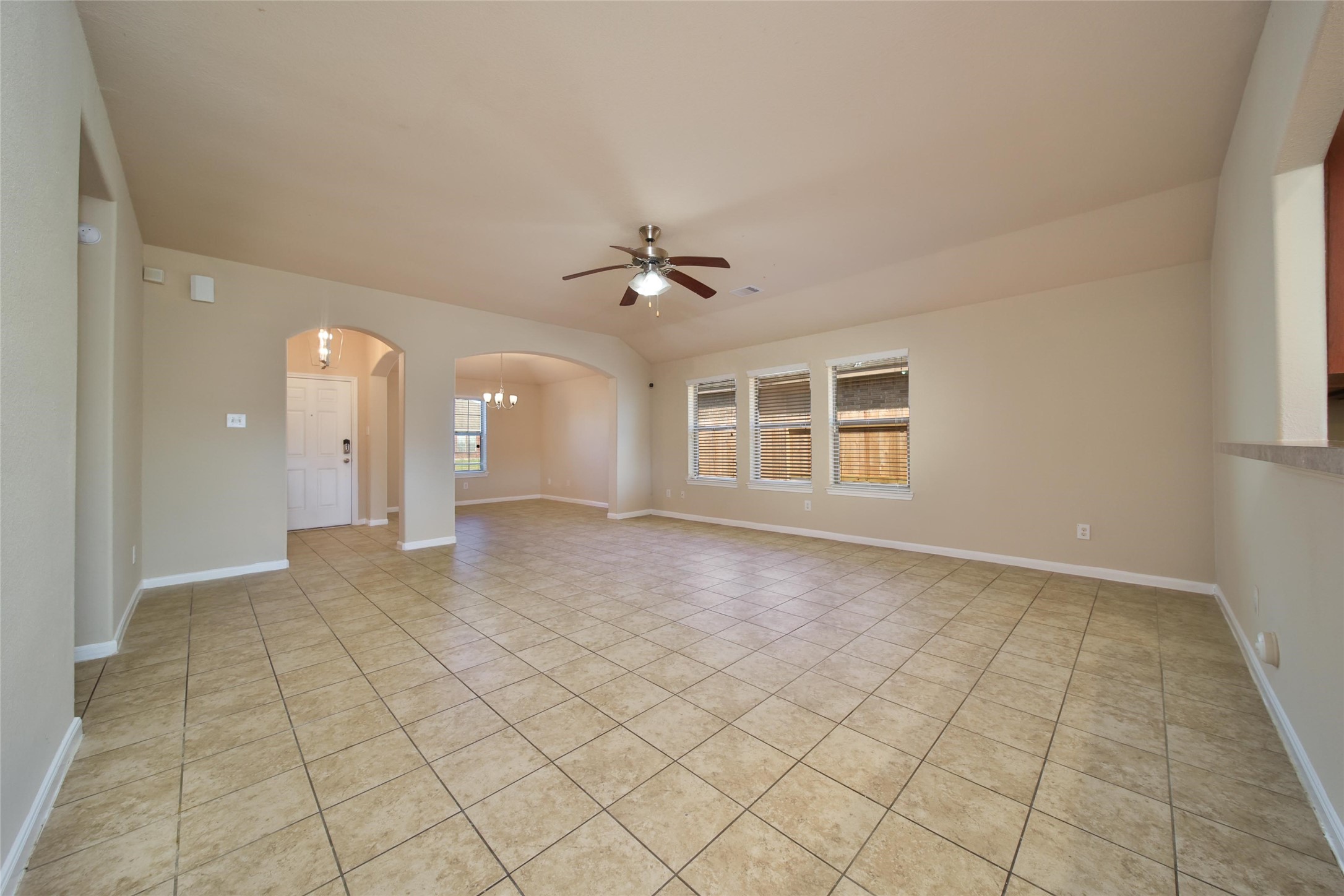 19134 Painted Boulevard Porter, TX 77365 - Photo 12 of 34 a view of an empty room with a window
