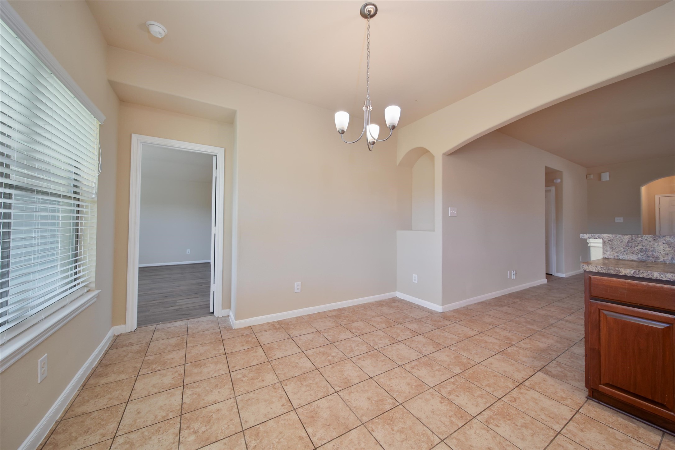 19134 Painted Boulevard Porter, TX 77365 - Photo 14 of 34 a view of livingroom with kitchen