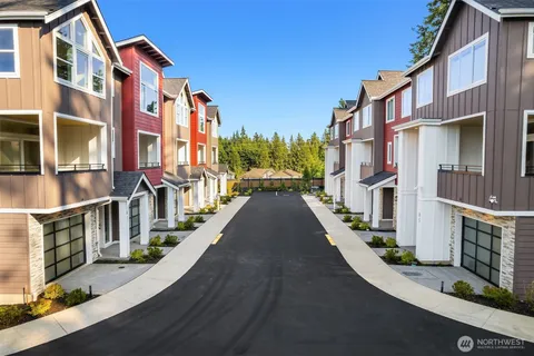 a view of a street with buildings