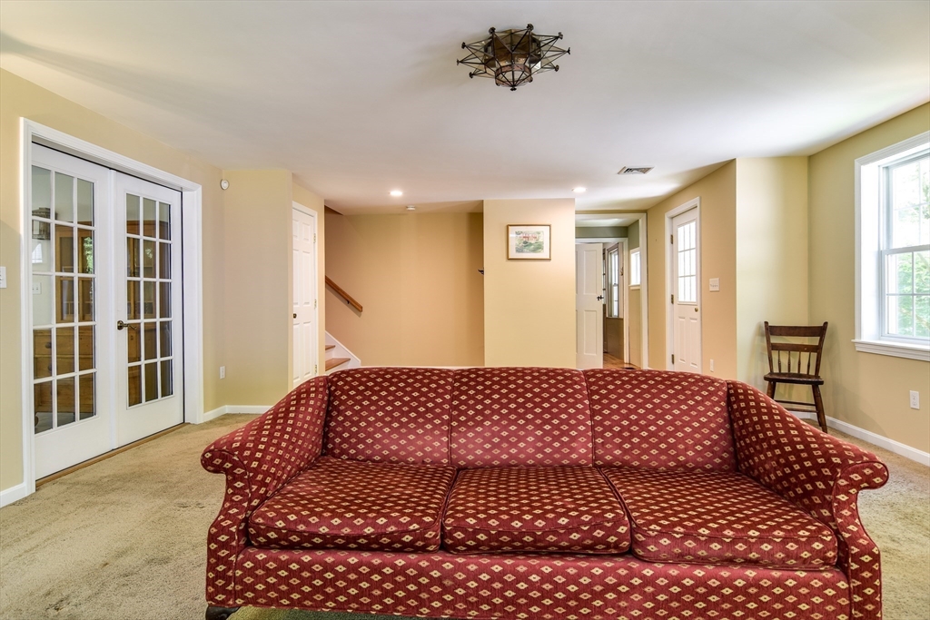33 Grove Street Framingham, MA 01701 - Photo 11 of 33 a bedroom with a large bed and a window