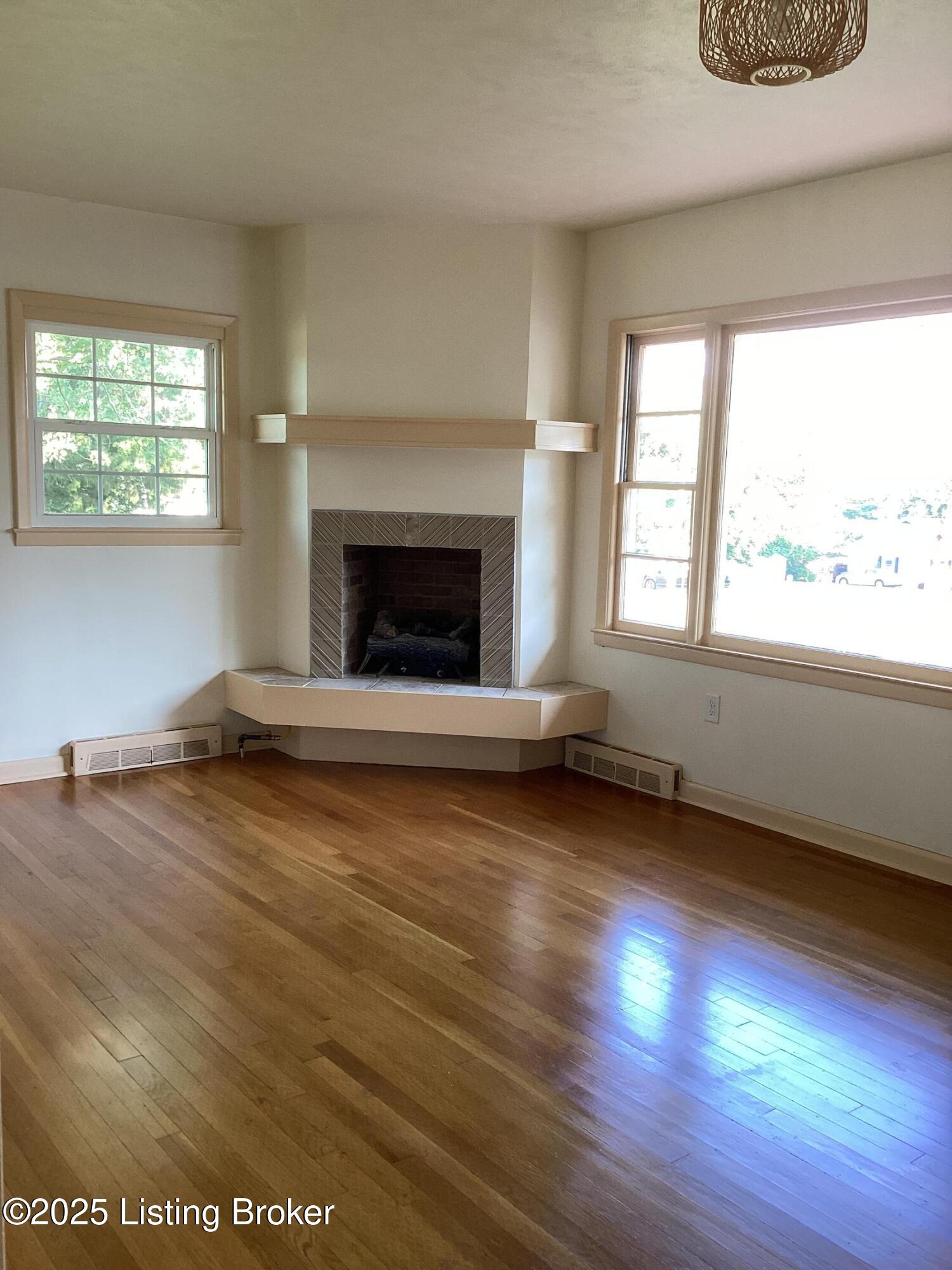 305 West 1st Street Perryville, KY 40468 - Photo 13 of 32 Living room with gas fireplace