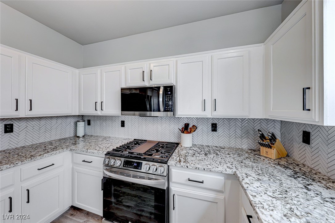 7702 Hampton Willows Lane Las Vegas, NV 89113 - Photo 3 of 38 CUSTOM REMODEL! 7702 Hampton Willows Las Vegas NV