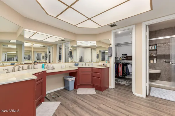 a large kitchen with lots of counter space and stainless steel appliances