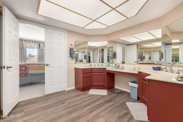 a kitchen with stainless steel appliances kitchen island granite countertop a sink and cabinets
