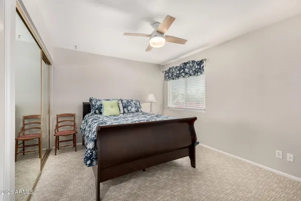 a view of swimming pool with outdoor seating and plants