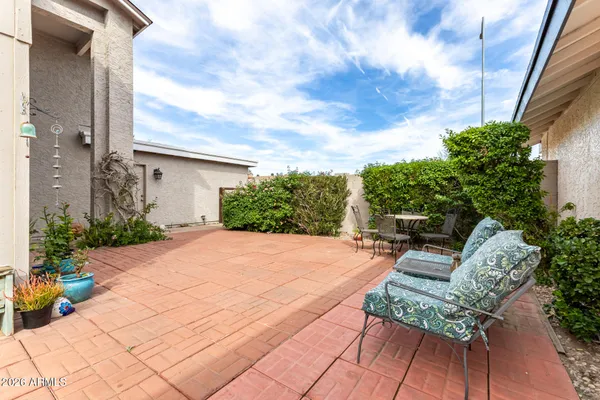 a bunch of flowers in front of a window