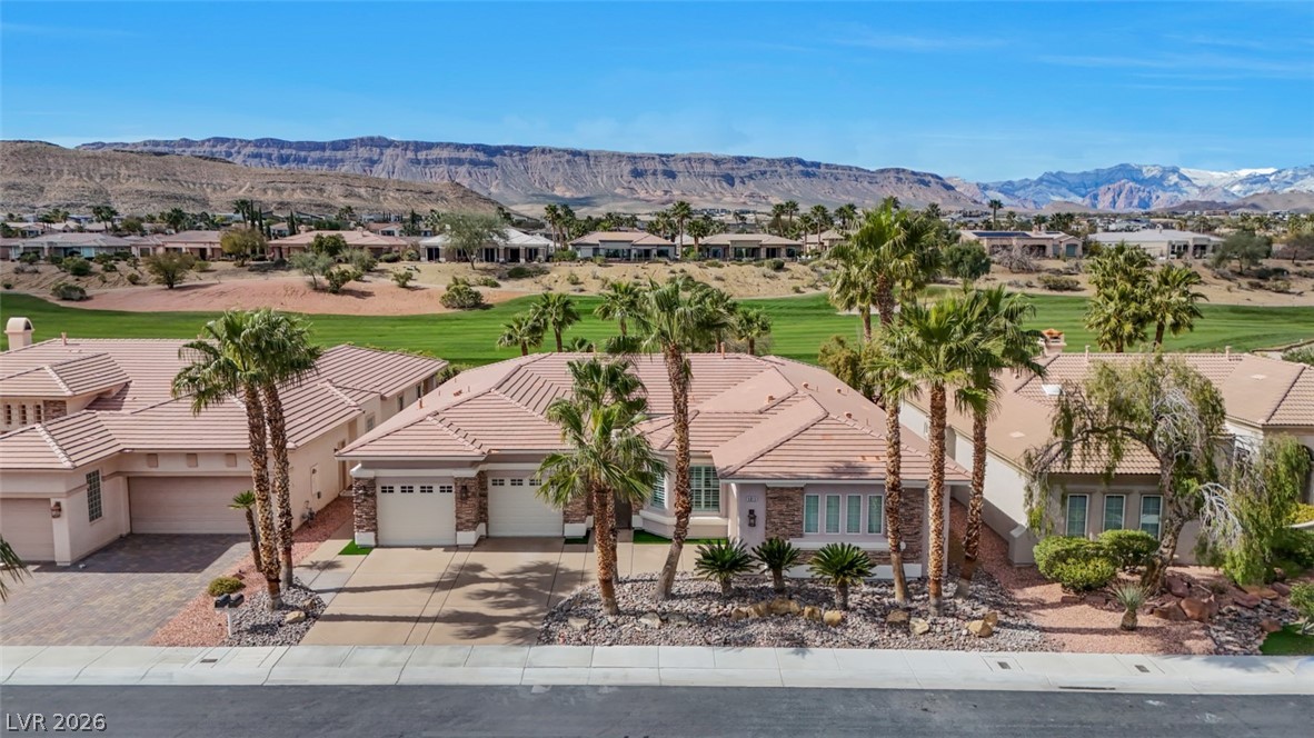 5015 Rivedro Street Las Vegas, NV 89135 - Photo 67 of 91 A desert oasis with majestic mountain views, offering serene golf course frontage.