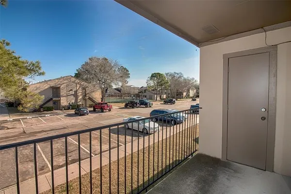 a view of a street from a balcony