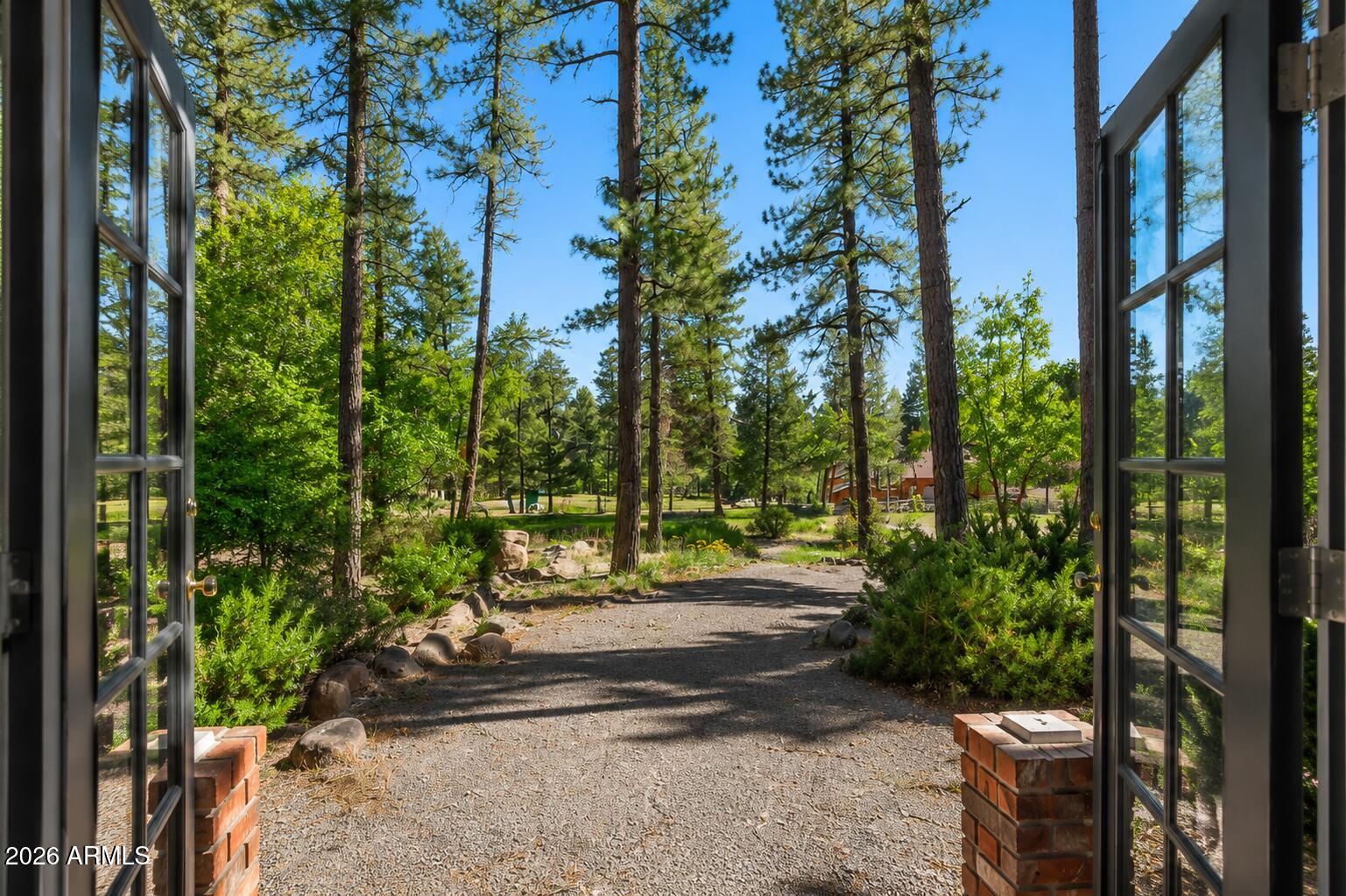 700 East Crestline Road Munds Park, AZ 86017 - Photo 9 of 61 Front yard from entry:sunroom