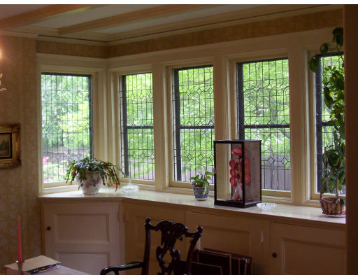 152 Mulberry Street Springfield, MA 01105 - Photo 5 of 7 a living room with a large window and floor to ceiling window