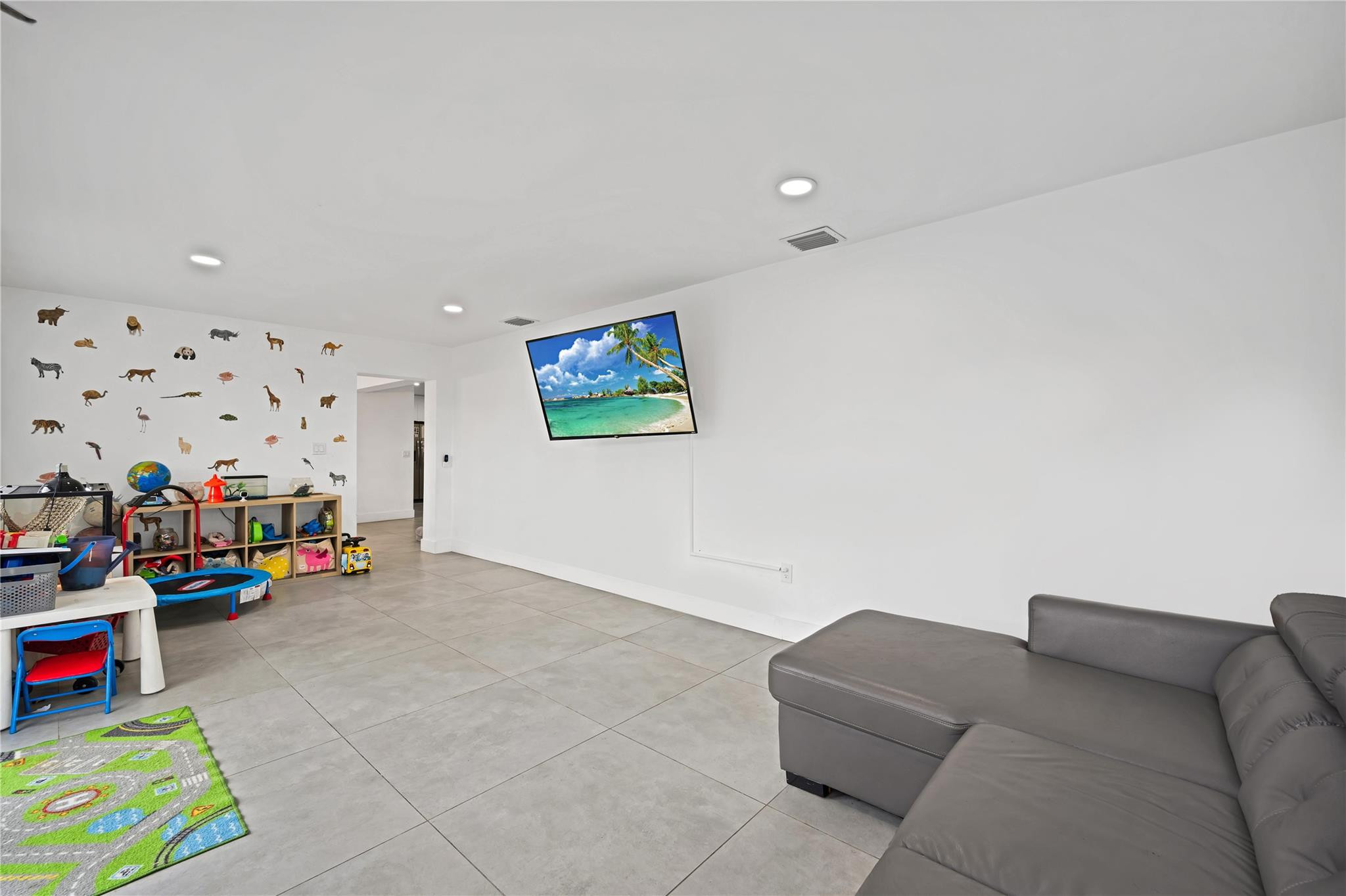 300 Southwest 65th Way Pembroke Pines, FL 33023 - Photo 15 of 35 a living room with furniture and a couch