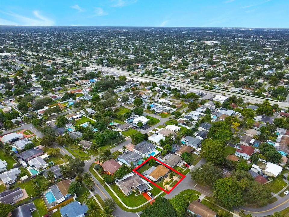 300 Southwest 65th Way Pembroke Pines, FL 33023 - Photo 32 of 35 an aerial view of residential houses with outdoor space and trees