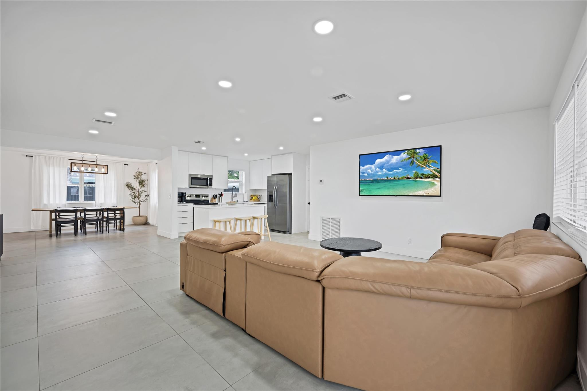 300 Southwest 65th Way Pembroke Pines, FL 33023 - Photo 9 of 35 a living room with furniture and kitchen view