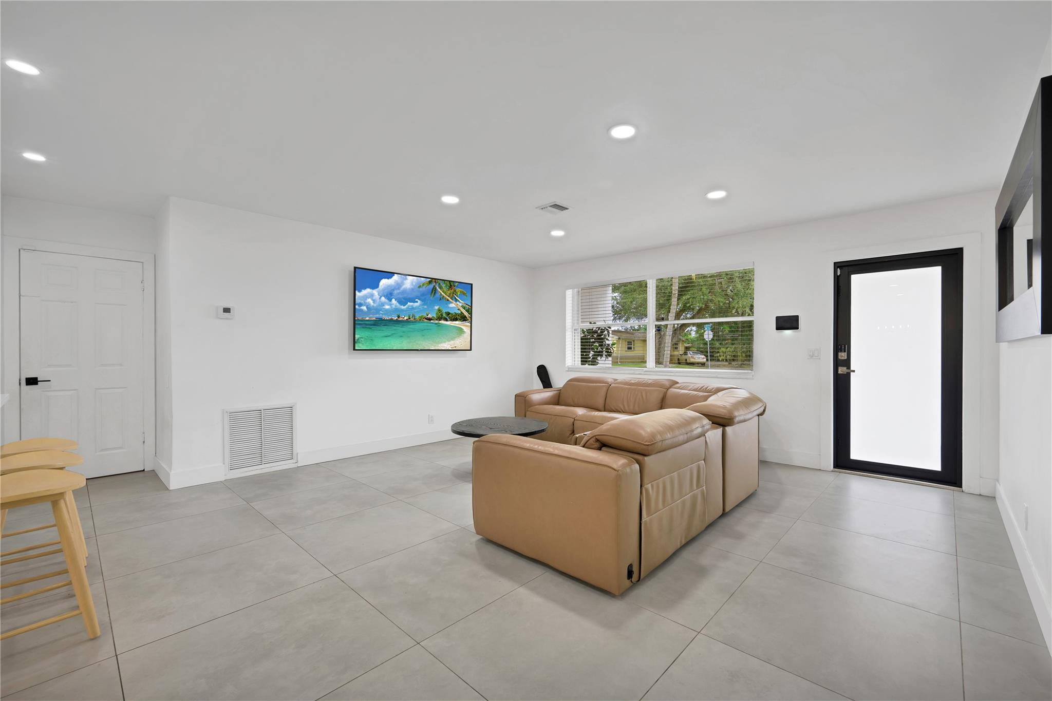 300 Southwest 65th Way Pembroke Pines, FL 33023 - Photo 10 of 35 a living room with furniture and a window