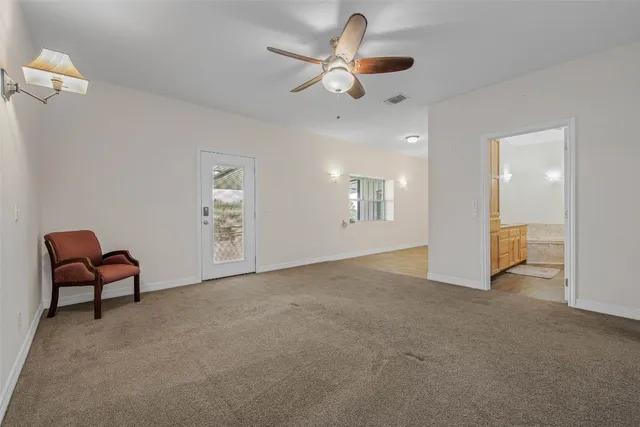 a view of a livingroom with a fan