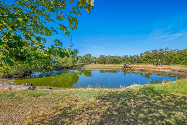a view of an ocean and city