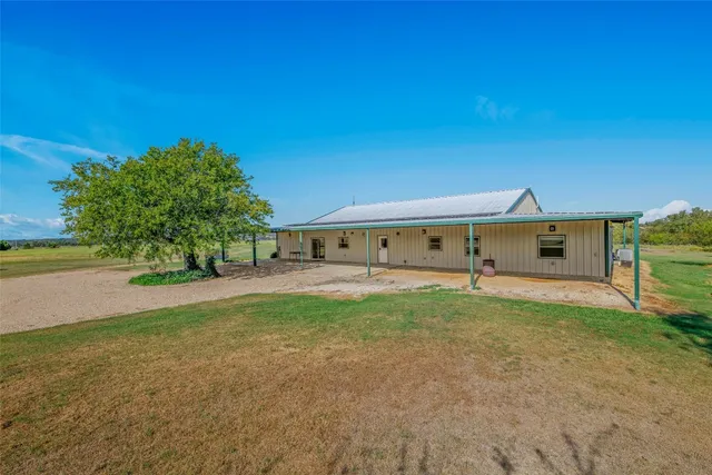 a house view with a garden space