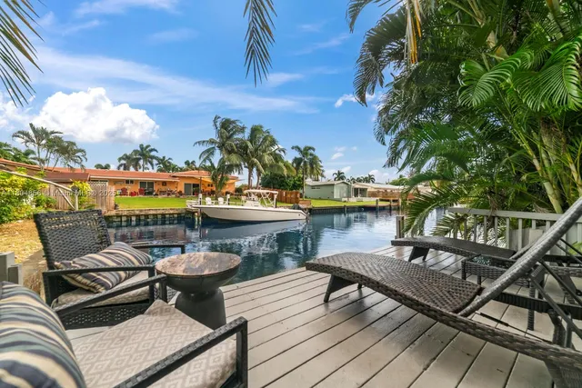 a view of a chairs and table on the terrace