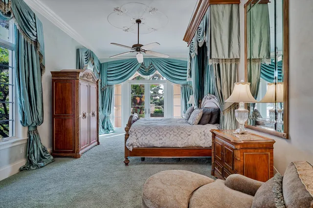 a bedroom with a bed and a walk in closet