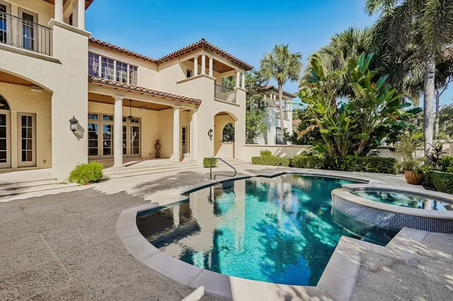 a front view of a house with swimming pool