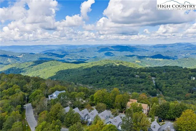 a view of a yard with an outdoor space