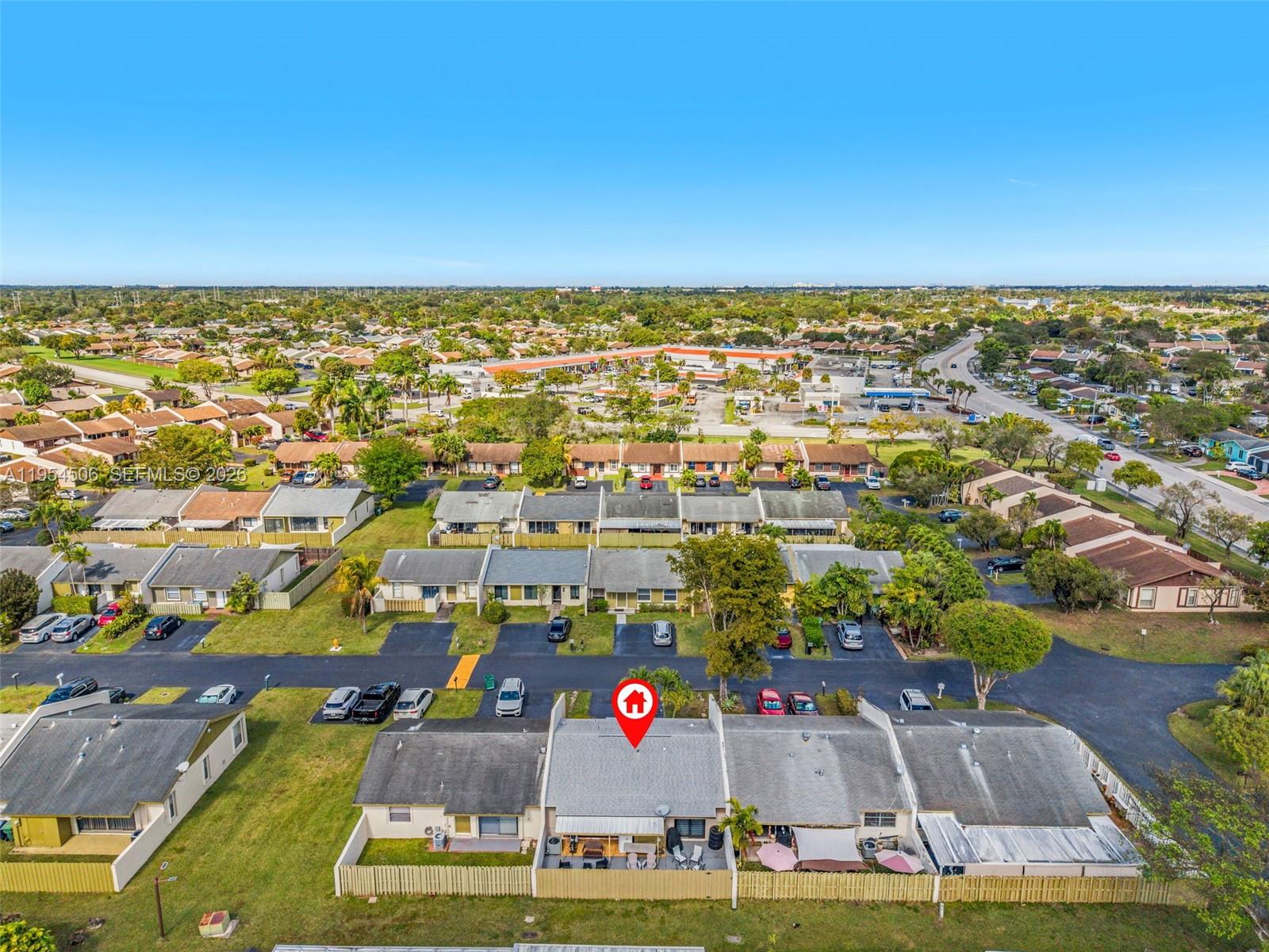 12234 Southwest 114th Terrace Miami, FL 33186 - Photo 8 of 22 an aerial view of multiple houses with yard