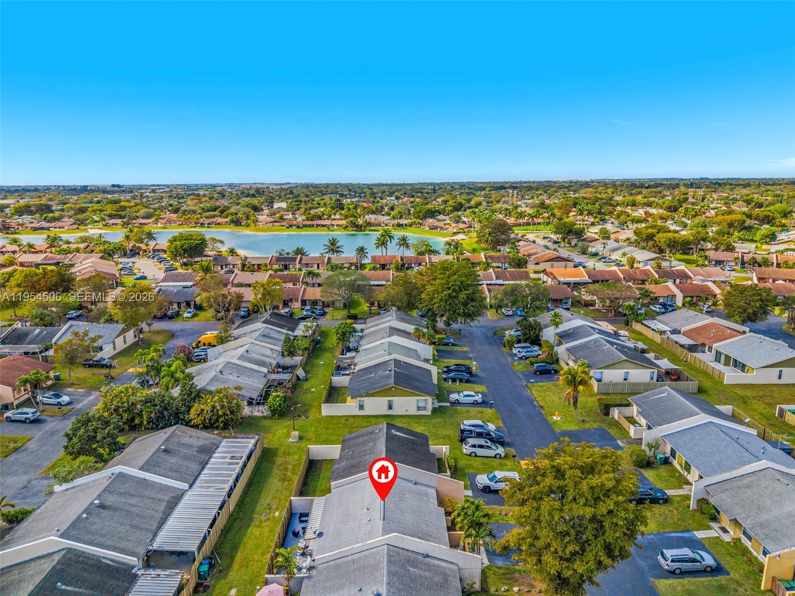 12234 Southwest 114th Terrace Miami, FL 33186 - Photo 9 of 22 an aerial view of residential houses with outdoor space